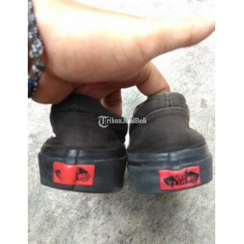 vans slip on full black